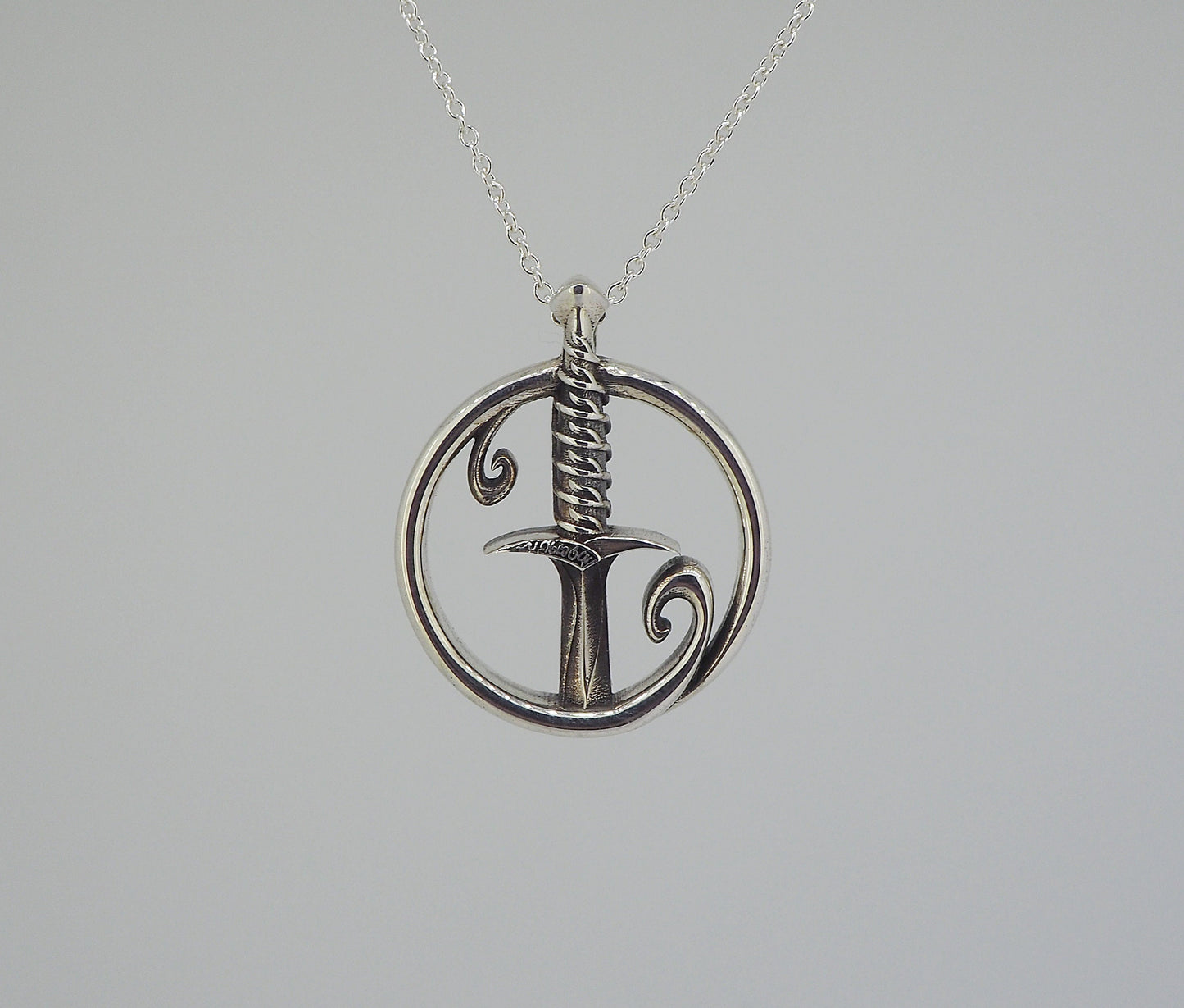 Sting Sword Hilt Silver Pendant